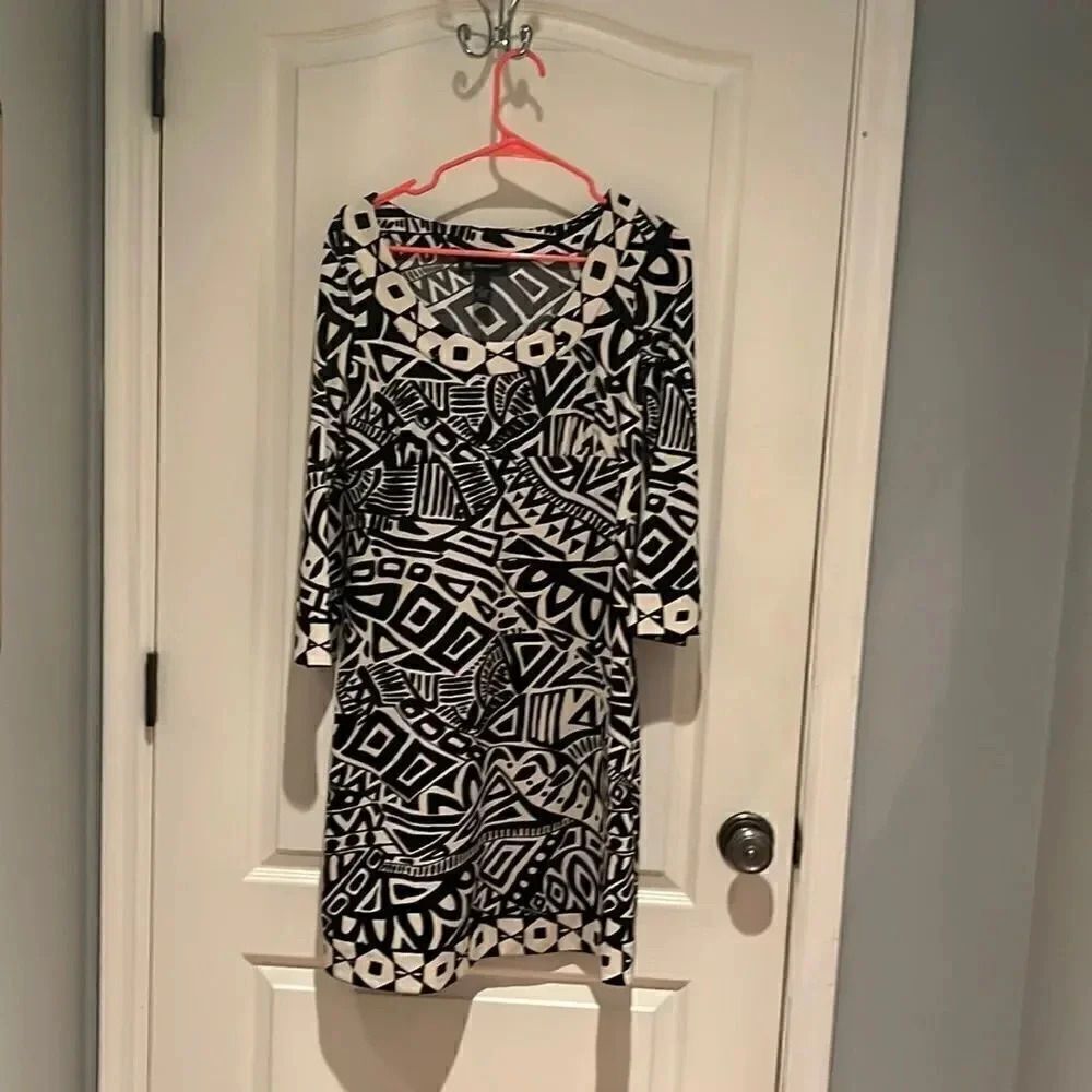 Exotic looking dress by I NC. Size M